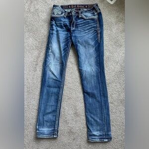 Woman’s Rock Revival Cyrus Mid-Rise Straight Stretch Jean size 31x34
